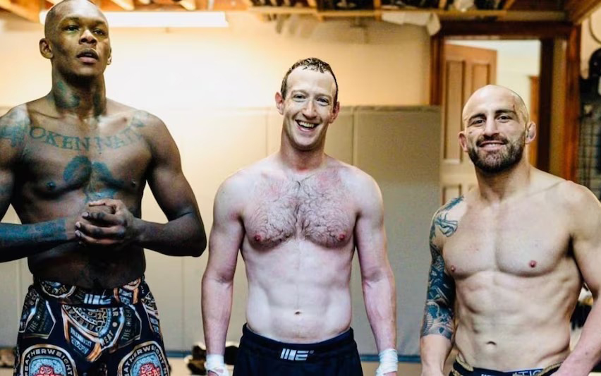 Mark Zuckerberg with two professional MMA fighters